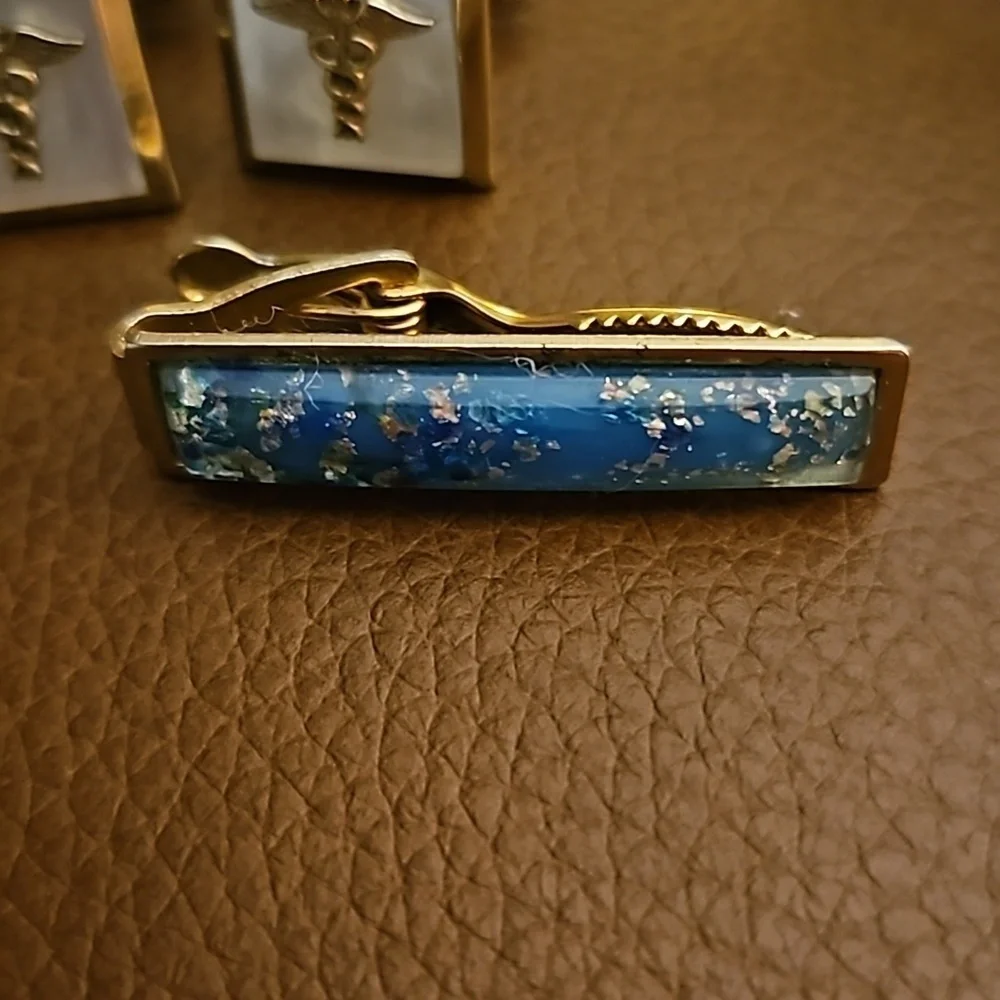 Vintage Goldtone MOP Caduceus Cufflinks and Blue Resin Tie Clip Set